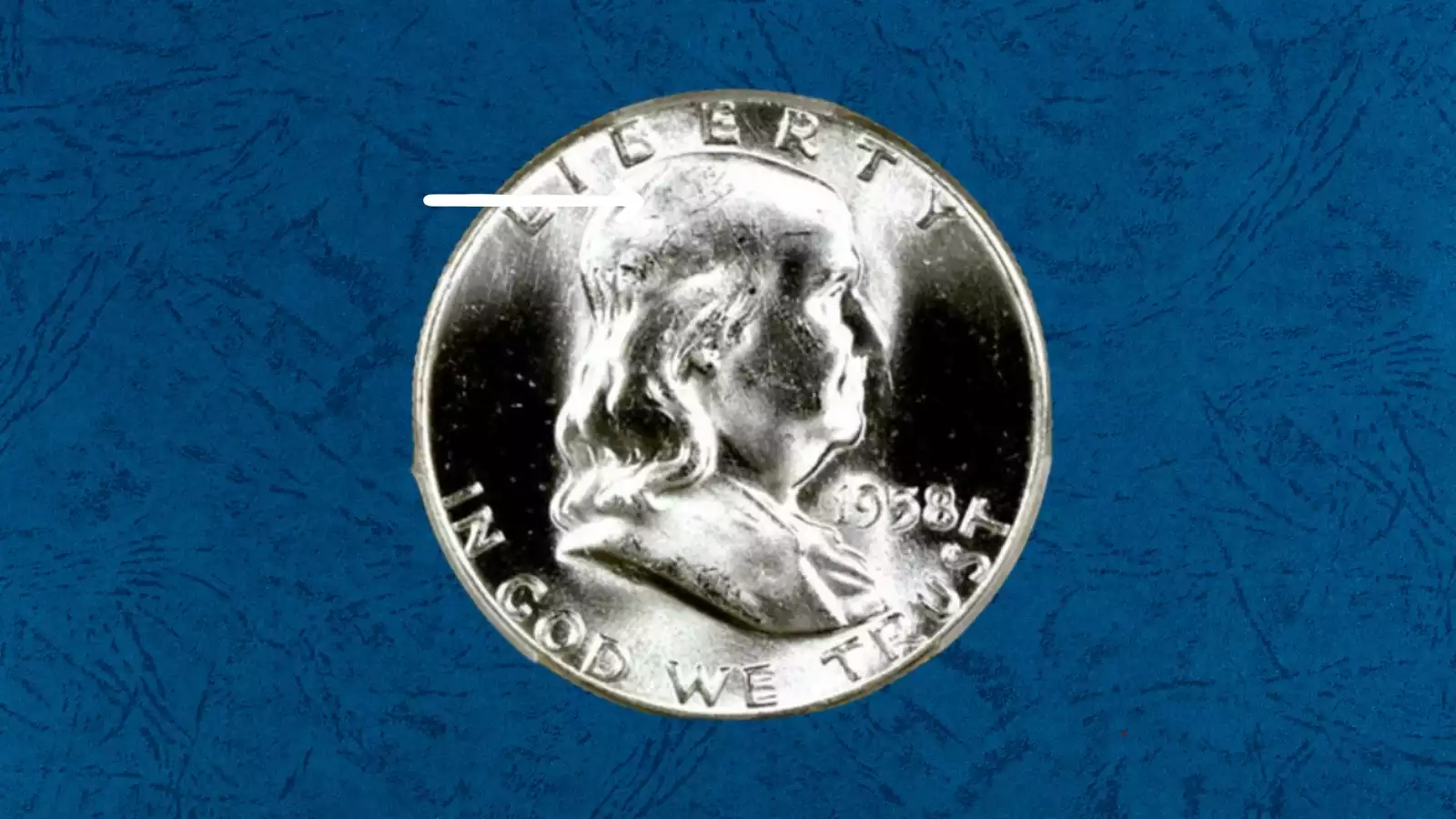 1958 Franklin half dollar FS-402 Obverse Die Clash showing ghost impression of reverse Liberty Bell in obverse fields